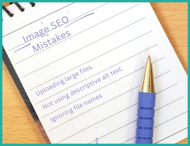 Pen and paper with common image optimisation mistakes written on it