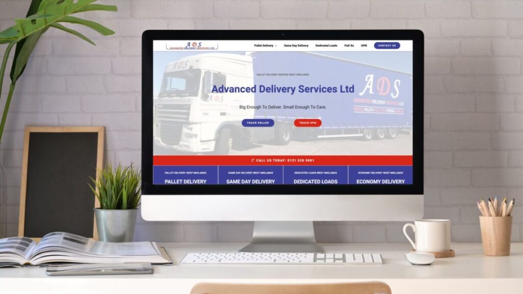 A desktop computer displaying the homepage of Advanced Delivery Services Ltd, a logistics and pallet delivery company.