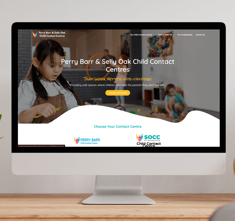 A desktop monitor displaying the Perry Barr & Selly Oak Child Contact Centres website, featuring children playing and buttons to find local centres.