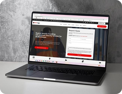 A laptop on a desk showing the Region Security Guarding website, featuring a "Request A Quote" form and information on SIA-licensed security services.