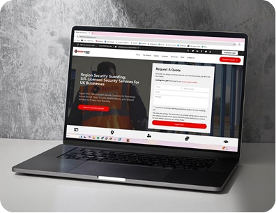Laptop on a desk displaying a security services website with a ‘Request a Quote’ form on screen.”