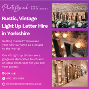 Rustic vintage light-up letter hire display for weddings in Yorkshire, showing illuminated wooden letters used as décor and a photo backdrop.