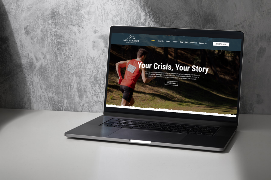 Desktop computer displaying the Midlife Crisis Races & Retreats website, representing hospitality and leisure industry-focused marketing and website design solutions for adventure and wellness businesses.