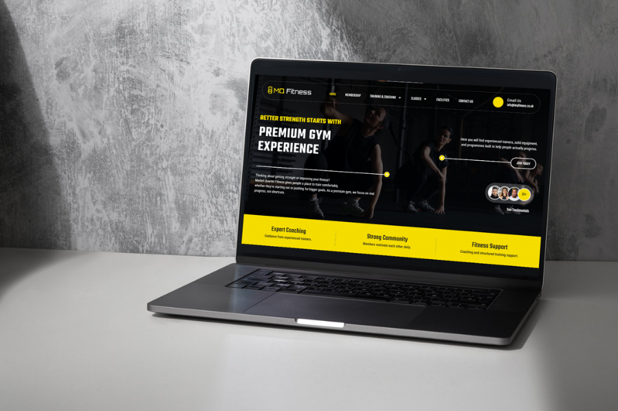 Desktop computer displaying the MO Fitness website, representing hospitality and leisure industry-focused marketing and website design solutions for gyms and fitness businesses.
