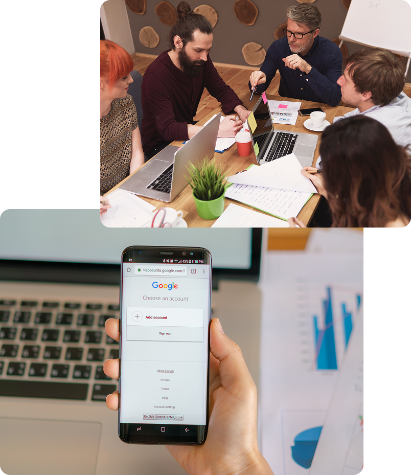Marketing professionals discussing industry-focused marketing strategies while analysing digital performance data on laptops and mobile devices.