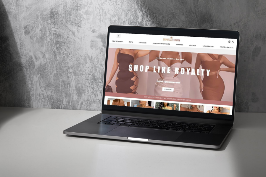 Desktop computer displaying the Empress of London fashion e-commerce website, representing retail and e-commerce industry-focused marketing and luxury online store design solutions.