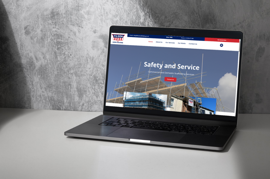 Desktop computer displaying the Filson Scaffolding website, representing construction company marketing and industry-focused website design solutions for scaffolding and trade businesses.