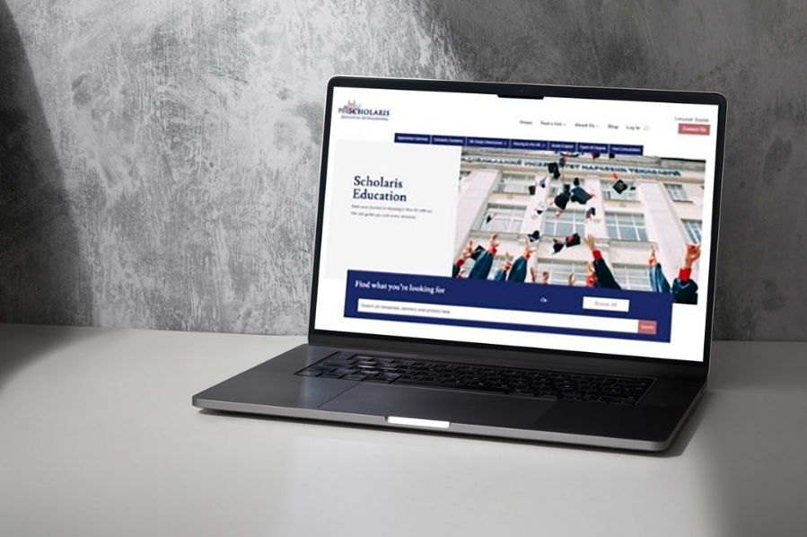 Desktop computer displaying the Scholaris Education International website, representing industry-focused marketing and website design solutions for education and international learning providers.